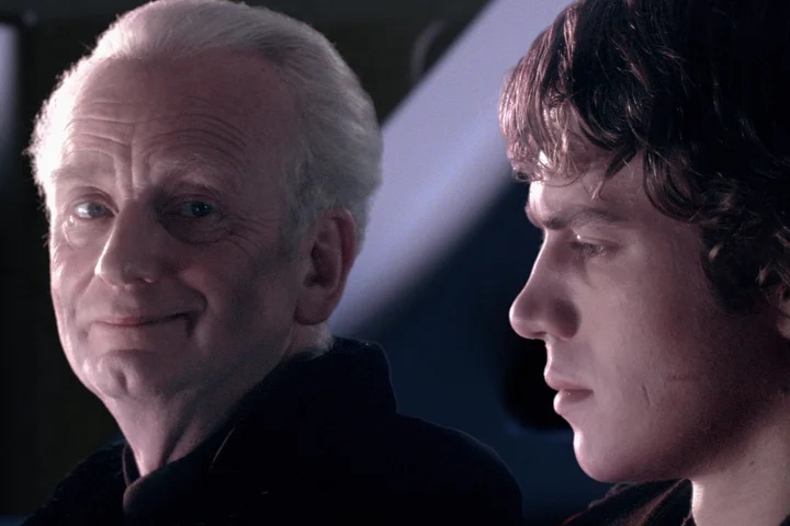 A scene from Star Wars: Revenge of the Sith, where Palpatine and Anakin are in the theatre